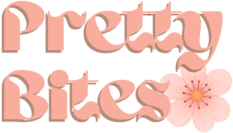 Logo with 'Pretty Bites' text and a pink flower on a white background